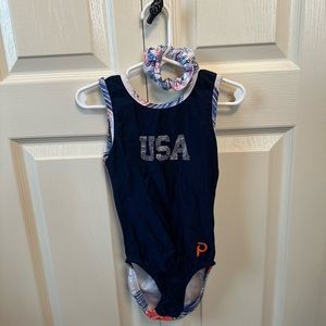 Plum gymnastic USA red white and blue Leo.Scrunchie .Used,excellent condition